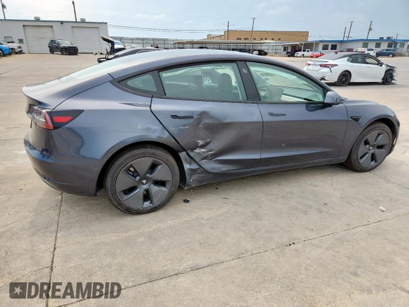 2023 Tesla Model 3 with VIN 5YJ3E1EA1PF468627, listed as a Copart auction lot 57285575 with 5,952 mi miles and Salvage title. Bid and sale history available at DreamBid. Image 3.