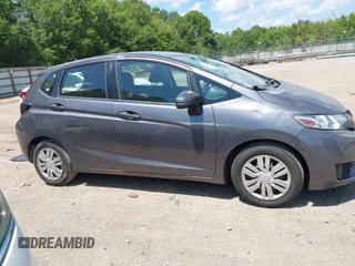 2015 Honda Fit LX with VIN 3HGGK5G57FM747786, listed as a IAAI auction lot 42656703 with 102,637 mi miles and . Bid and sale history available at DreamBid. Image 13.