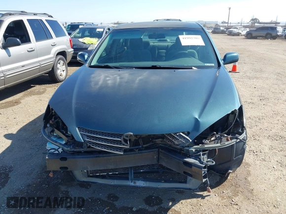 2004 Toyota Camry LE with VIN 4T1BE32K64U340905, listed as a IAAI auction lot 41992386 with 112,292 mi miles. Bid and sale history available at carsss.com. Image 6.