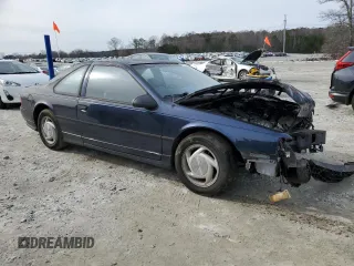 1991 Ford Thunderbird with VIN 1FAPP64R3MH164460, listed as a Copart auction lot 43114305 with 86,771 mi miles and Salvage Title. Bid and sale history available at DreamBid. Image 4.