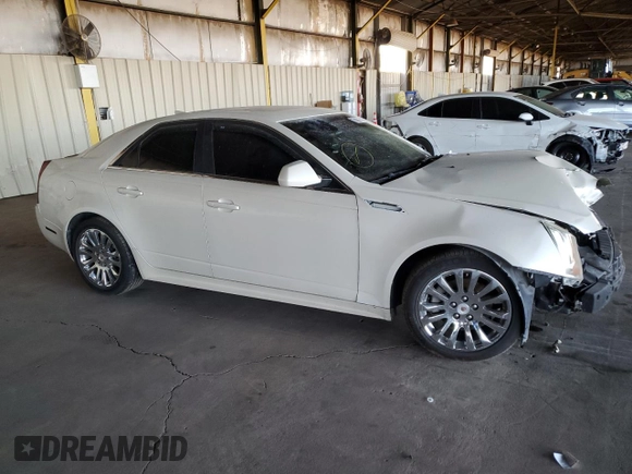 2011 Cadillac CTS Performance with VIN 1G6DJ5EY8B0158893, listed as a Copart auction lot 74089484 with 124,439 mi miles and Salvage Title. Bid and sale history available at carsss.com. Image 4.