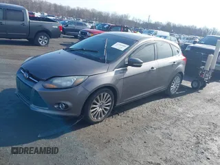 2012 Ford Focus Titanium with VIN 1FAHP3N28CL270225, listed as a IAAI auction lot 41401080 with 80,650 mi miles and . Bid and sale history available at carsss.com. Image 2.