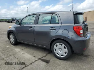 2011 Scion xD with VIN JTKKU4B41B1014726, listed as a Copart auction lot 65149405 with 210,102 mi miles and Salvage title. Bid and sale history available at DreamBid. Image 2.