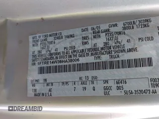 2006 Ford Econoline Cargo with VIN 1FTRE14W36HA38006, listed as a IAAI auction lot 41804095 with Not Provided miles. Bid and sale history available at carsss.com. Image 9.