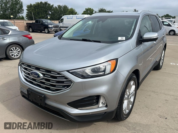 2020 Ford Edge Titanium z VIN 2FMPK3K95LBA30633, wystawiony jako IAAI lot #42473515 z przebiegiem 104 190 mil mil oraz . Historia ofert i sprzedaży dostępna na DreamBid. Obrazek 14.