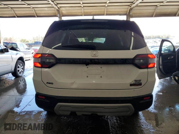 2025 Honda Pilot TrailSport z VIN 5FNYG1H67SB094346, wystawiony jako Copart lot #51415995 z przebiegiem 5 871 mil mil oraz Szkoda całkowita • Salvage title. Historia ofert i sprzedaży dostępna na DreamBid. Obrazek 6.