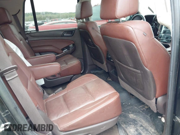 2016 Chevrolet Tahoe LTZ with VIN 1GNSKCKC7GR171904, listed as a IAAI auction lot 41967060 with 223,334 mi miles and . Bid and sale history available at DreamBid. Image 8.