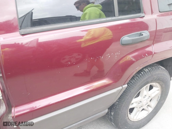 2003 Jeep Grand Cherokee Laredo with VIN 1J4GW48S83C563627, listed as a IAAI auction lot 41910225 with 150,264 mi miles. Bid and sale history available at carsss.com. Image 6.