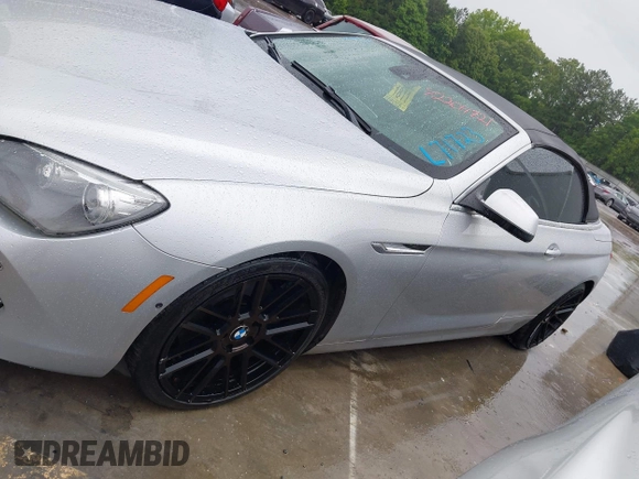 2012 BMW 6 Series 650i with VIN WBALZ3C5XCDL71723, listed as a IAAI auction lot 42204721 with 132,912 mi miles and . Bid and sale history available at carsss.com. Image 14.