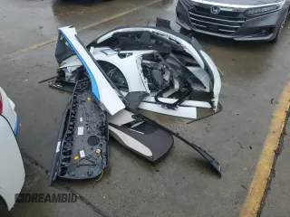 2017 BMW i8 z VIN WBY2Z2C39HV676797, wystawiony jako Copart lot #87025394 z przebiegiem 51 543 mil mil oraz Szkoda całkowita • Salvage title. Historia ofert i sprzedaży dostępna na DreamBid. Obrazek 12.