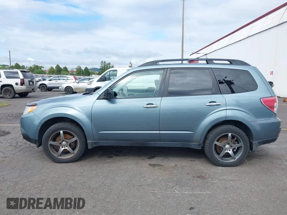 2009 Subaru Forester X Limited z VIN JF2SH64679H745265, wystawiony jako IAAI lot #42205180 z przebiegiem 173 852 mil mil oraz . Historia ofert i sprzedaży dostępna na DreamBid. Obrazek 14.