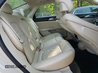 2015 Lincoln MKZ z VIN 3LN6L2JK4FR629312, wystawiony jako Copart lot #60230405 z przebiegiem 79 570 mil mil oraz Szkoda całkowita • Salvage title. Historia ofert i sprzedaży dostępna na DreamBid. Obrazek 10.