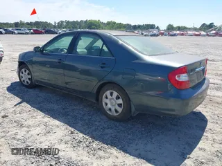 2002 Toyota Camry LE z VIN 4T1BE32K02U587544, wystawiony jako IAAI lot #42291358 z przebiegiem Nie podano mil oraz . Historia ofert i sprzedaży dostępna na DreamBid. Obrazek 3.