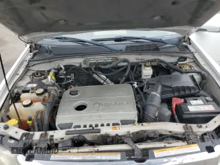 2011 Ford Escape Hybrid with VIN 1FMCU4K30BKB66313, listed as a Copart auction lot 58771165 with 297,214 mi miles and Salvage title. Bid and sale history available at DreamBid. Image 12.
