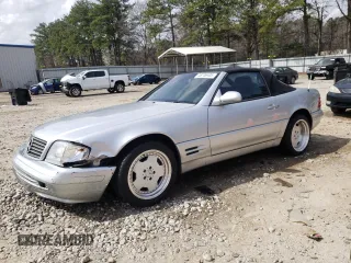 1999 Mercedes-Benz SL-Class with VIN WDBFA68F3XF182706, listed as a Copart auction lot 48736405 with 116,560 mi miles and Salvage Title. Bid and sale history available at carsss.com. Image 1.