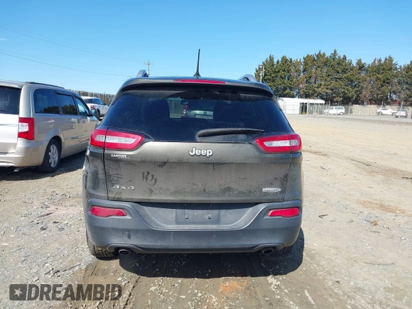 2014 Jeep Cherokee Latitude with VIN 1C4PJMCS5EW201462, listed as a IAAI auction lot 41727379 with 170,958 mi miles and . Bid and sale history available at DreamBid. Image 17.