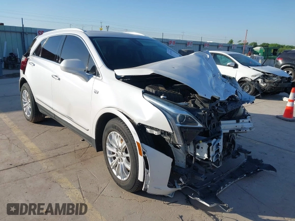2018 Cadillac XT5 Luxury FWD z VIN 1GYKNCRS3JZ143354, wystawiony jako IAAI lot #41973536 z przebiegiem 101 327 mil mil oraz . Historia ofert i sprzedaży dostępna na DreamBid. Obrazek 1.