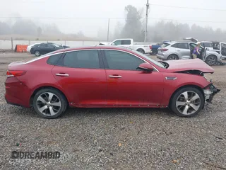 2019 Kia Optima LX with VIN 5XXGT4L32KG360570, listed as a IAAI auction lot 41497880 with 120,744 mi miles. Bid and sale history available at carsss.com. Image 14.
