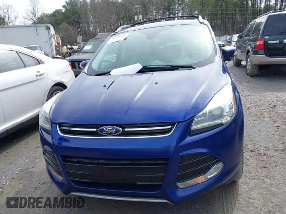 2016 Ford Escape Titanium with VIN 1FMCU9JXXGUA71898, listed as a IAAI auction lot 41758284 with 51,935 mi miles. Bid and sale history available at carsss.com. Image 12.