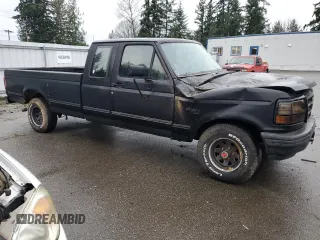 1992 Ford F-150 with VIN 1FTEX14N2NKB29155, listed as a Copart auction lot 84871474 with 104,765 mi miles and Salvage Title. Bid and sale history available at carsss.com. Image 4.