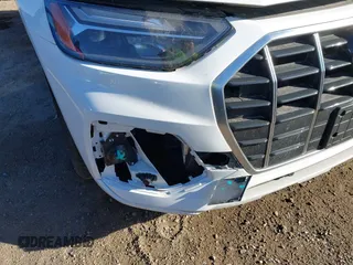 2022 Audi Q5 Premium Plus z VIN WA1BBAFY0N2078094, wystawiony jako IAAI lot #42061485 z przebiegiem 23 152 mil mil oraz . Historia ofert i sprzedaży dostępna na DreamBid. Obrazek 18.