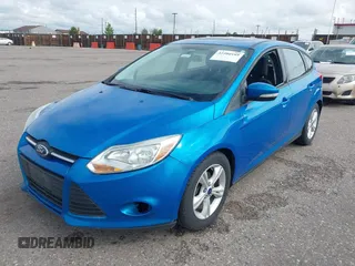 2014 Ford Focus SE z VIN 1FADP3K23EL396126, wystawiony jako IAAI lot #42380189 z przebiegiem 143 298 mil mil oraz . Historia ofert i sprzedaży dostępna na DreamBid. Obrazek 2.