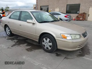 2001 Toyota Camry CE z VIN JT2BG22K610603317, wystawiony jako IAAI lot #41975217 z przebiegiem 149 292 mil mil oraz . Historia ofert i sprzedaży dostępna na DreamBid. Obrazek 1.
