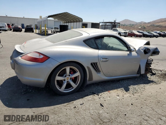 2006 Porsche Cayman S с VIN WP0AB298X6U784563, выставлен на аукционе Copart как лот 69819084 с пробегом 132 131 миль миль и Списание • Salvage title. История ставок и продаж доступна на DreamBid. Изображение 3.
