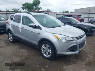 2014 Ford Escape SE z VIN 1FMCU9GX7EUA13672, wystawiony jako IAAI lot #42156708 z przebiegiem Nie podano mil oraz . Historia ofert i sprzedaży dostępna na DreamBid. Obrazek 1.