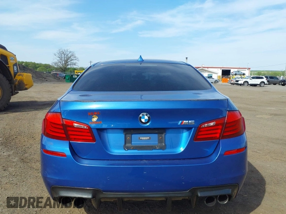 2013 BMW M5 with VIN WBSFV9C56DC774032, listed as a IAAI auction lot 42124754 with 55,409 mi miles. Bid and sale history available at carsss.com. Image 16.