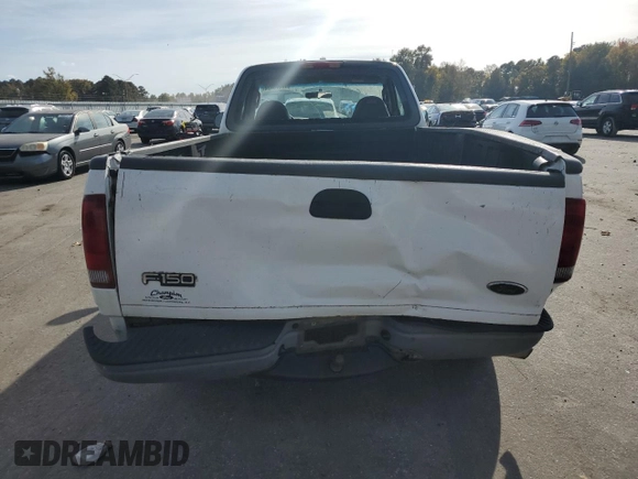 2003 Ford F-150 XL with VIN 1FTRF17W03NA39409, listed as a Copart auction lot 78578434 with 142,299 mi miles and Salvage Title. Bid and sale history available at DreamBid. Image 6.
