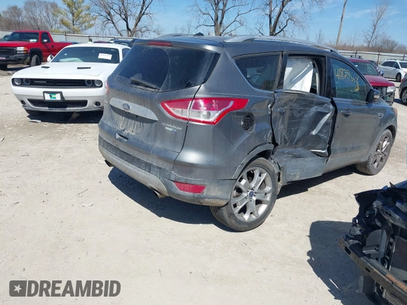 2014 Ford Escape Titanium with VIN 1FMCU9J93EUC72752, listed as a IAAI auction lot 41827668 with 91,194 mi miles and . Bid and sale history available at DreamBid. Image 4.