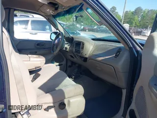 2003 Ford F-150 XL with VIN 1FTRX18LX3NA50127, listed as a IAAI auction lot 42145481 with 199,955 mi miles and . Bid and sale history available at DreamBid. Image 5.
