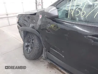 2019 Jeep Cherokee Trailhawk with VIN 1C4PJMBX9KD456748, listed as a IAAI auction lot 42367186 with 91,665 mi miles and . Bid and sale history available at DreamBid. Image 6.