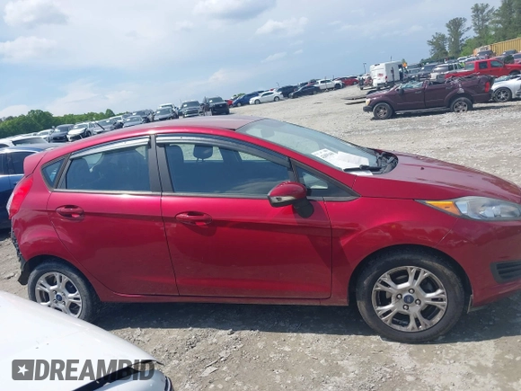 2016 Ford Fiesta SE z VIN 3FADP4EJ4GM178707, wystawiony jako IAAI lot #42095480 z przebiegiem 96 454 mil mil oraz . Historia ofert i sprzedaży dostępna na DreamBid. Obrazek 13.