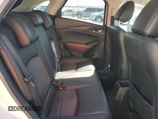 2018 Mazda CX-3 Touring z VIN JM1DKFC74J0312864, wystawiony jako Copart lot #55862845 z przebiegiem 75 584 mil mil oraz Szkoda całkowita • Salvage title. Historia ofert i sprzedaży dostępna na DreamBid. Obrazek 11.