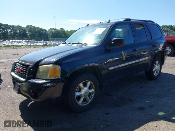 2005 GMC Envoy SLE with VIN 1GKDS13S452208252, listed as a IAAI auction lot 42357457 with 197,419 mi miles and . Bid and sale history available at DreamBid. Image 2.