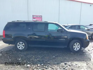 2014 GMC Yukon XL SLT with VIN 1GKS2KE77ER199723, listed as a IAAI auction lot 41555112 with 215,436 mi miles. Bid and sale history available at carsss.com. Image 13.