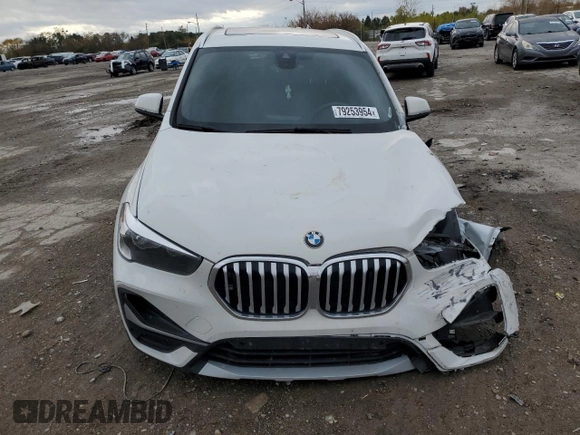 2022 BMW X1 xDrive28i with VIN WBXJG9C0XN5U63096, listed as a Copart auction lot 79253954 with 17,311 mi miles and Salvage title. Bid and sale history available at DreamBid. Image 5.