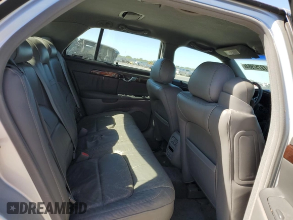 2003 Cadillac DeVille DHS z VIN 1G6KE54Y13U124690, wystawiony jako Copart lot #73757984 z przebiegiem 101 286 mil mil oraz Szkoda całkowita • Salvage title. Historia ofert i sprzedaży dostępna na DreamBid. Obrazek 10.