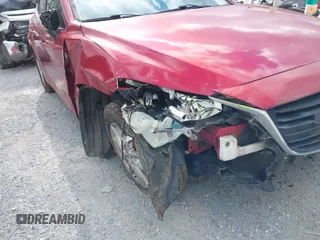 2014 Mazda 3 i Touring z VIN JM1BM1V74E1129708, wystawiony jako IAAI lot #42326641 z przebiegiem 169 773 mil mil oraz . Historia ofert i sprzedaży dostępna na DreamBid. Obrazek 6.