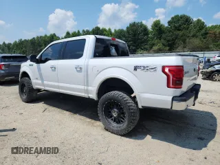 2017 Ford F-150 XL with VIN 1FTEW1EGXHKD51885, listed as a Copart auction lot 63326965 with 106,775 mi miles and Salvage title. Bid and sale history available at DreamBid. Image 2.