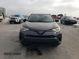 2018 Toyota RAV4 LE with VIN JTMBFREV8JJ260321, listed as a Copart auction lot 50588215 with 208,236 mi miles and Salvage title. Bid and sale history available at DreamBid. Image 5.