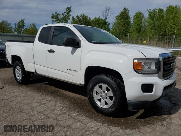2015 GMC Canyon z VIN 1GTH6AEA7F1163952, wystawiony jako Copart lot #56680505 z przebiegiem 123 025 mil mil oraz Czysty tytuł • Clean title. Historia ofert i sprzedaży dostępna na DreamBid. Obrazek 4.