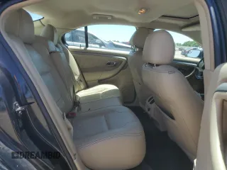 2014 Ford Taurus SEL z VIN 1FAHP2E81EG127398, wystawiony jako Copart lot #56666105 z przebiegiem 96 693 mil mil oraz Szkoda całkowita • Salvage title. Historia ofert i sprzedaży dostępna na DreamBid. Obrazek 10.