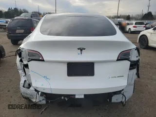 2023 Tesla Model Y Long Range with VIN 7SAYGDEE3PA130988, listed as a Copart auction lot 42172185 with 112,136 mi miles and Salvage Title. Bid and sale history available at DreamBid. Image 6.