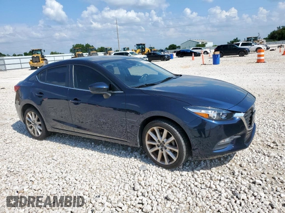 2017 Mazda 3 Touring with VIN 3MZBN1V71HM113502, listed as a Copart auction lot 60278205 with 82,780 mi miles and Salvage title. Bid and sale history available at DreamBid. Image 4.