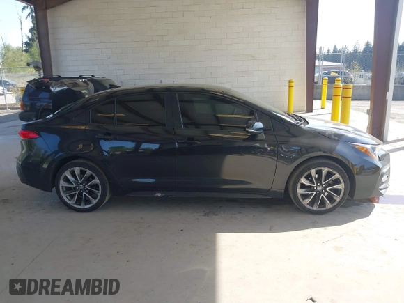 2022 Toyota Corolla SE with VIN JTDS4MCE3NJ094596, listed as a IAAI auction lot 42117369 with 92,045 mi miles and . Bid and sale history available at DreamBid. Image 13.