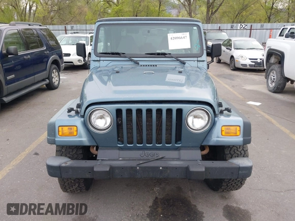 1998 Jeep Wrangler Sport with VIN 1J4FY19S8WP781437, listed as a IAAI auction lot 42096647 with 245,900 mi miles. Bid and sale history available at carsss.com. Image 6.