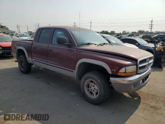 2000 Dodge Dakota Sport with VIN 1B7GG2AN1YS699073, listed as a Copart auction lot 70782284 with 141,876 mi miles and Salvage Title. Bid and sale history available at carsss.com. Image 4.